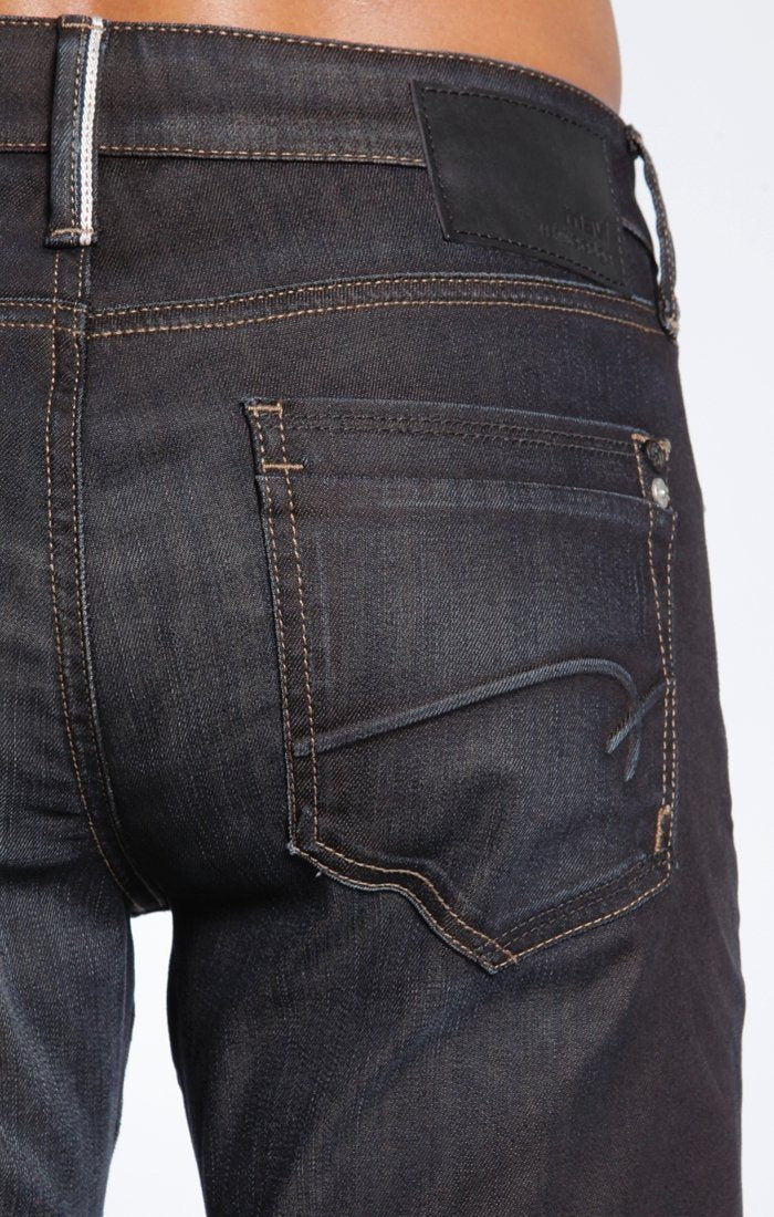 JAKE SLIM LEG IN COATED BROWN ITALY WHITE EDGE - Mavi Jeans